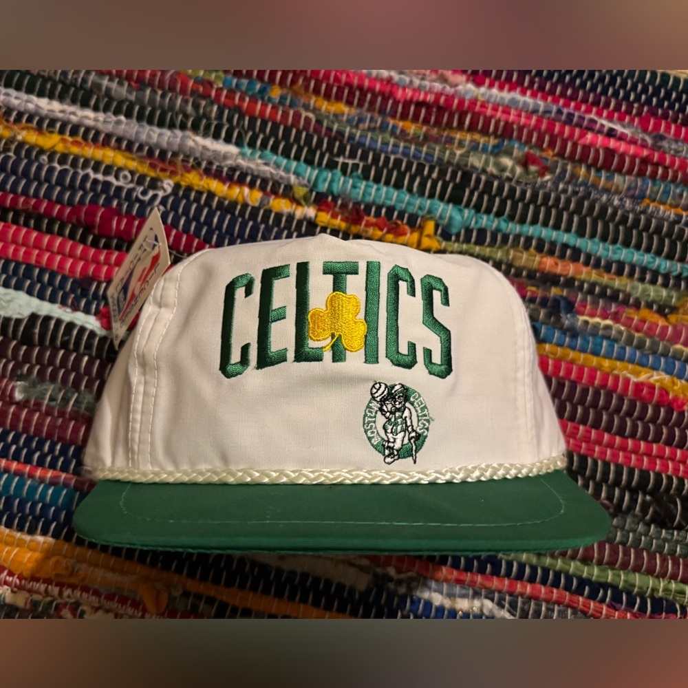BOSTON CELTICS 
VINTAGE OLD STOCK 
BRAND NEW 
RARE 
ADJUSTABLE